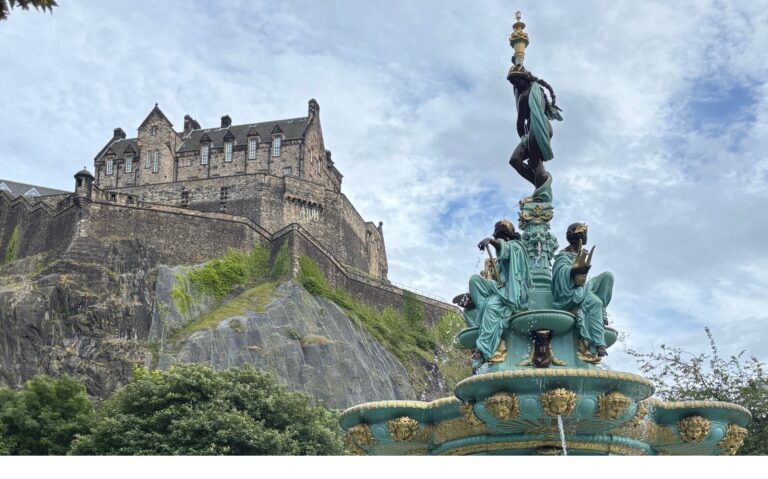 Ross Fountain in Princes Street Gardens with Castle in background.