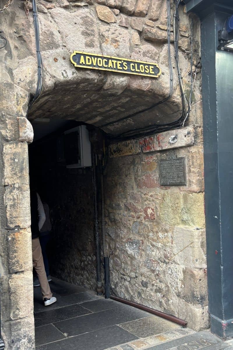 Stone arched entrance to Advocates Close of of Edinburgh's Royal Mile.