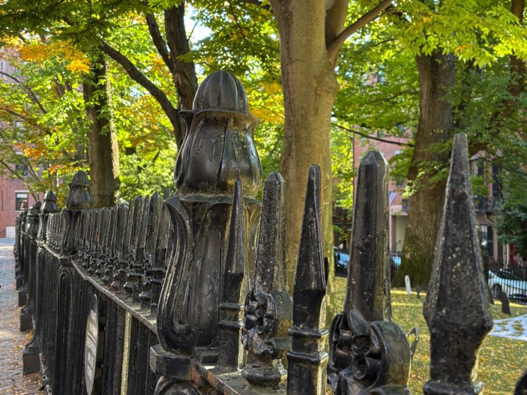 Wrought iron fence surrounding Louisburg Square in Boston’s Beacon Hill neighborhood.