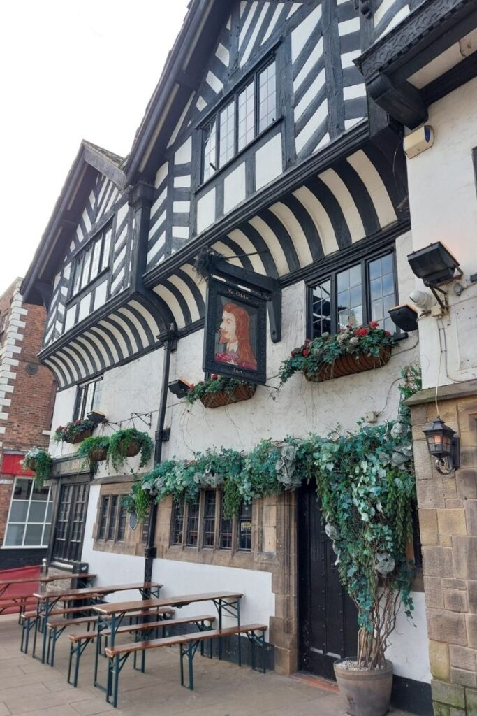 Exterior of Ye Olde King's Pub in Chester England, a Grade II listed building dating to 1622, showing half timber architecture.