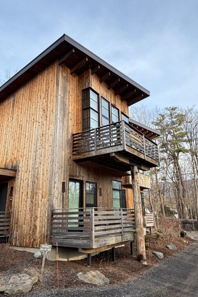Exterior of wooden structure which forms part of accommodation at Woodstock Way Hotel