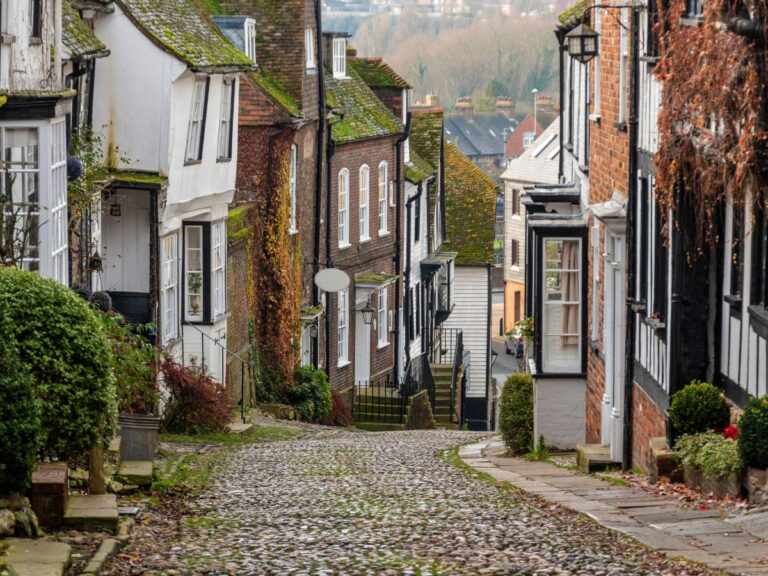 Mermaid Street Rye East Sussex looking down the steep cobbled street lined with historic timber-framed buildings