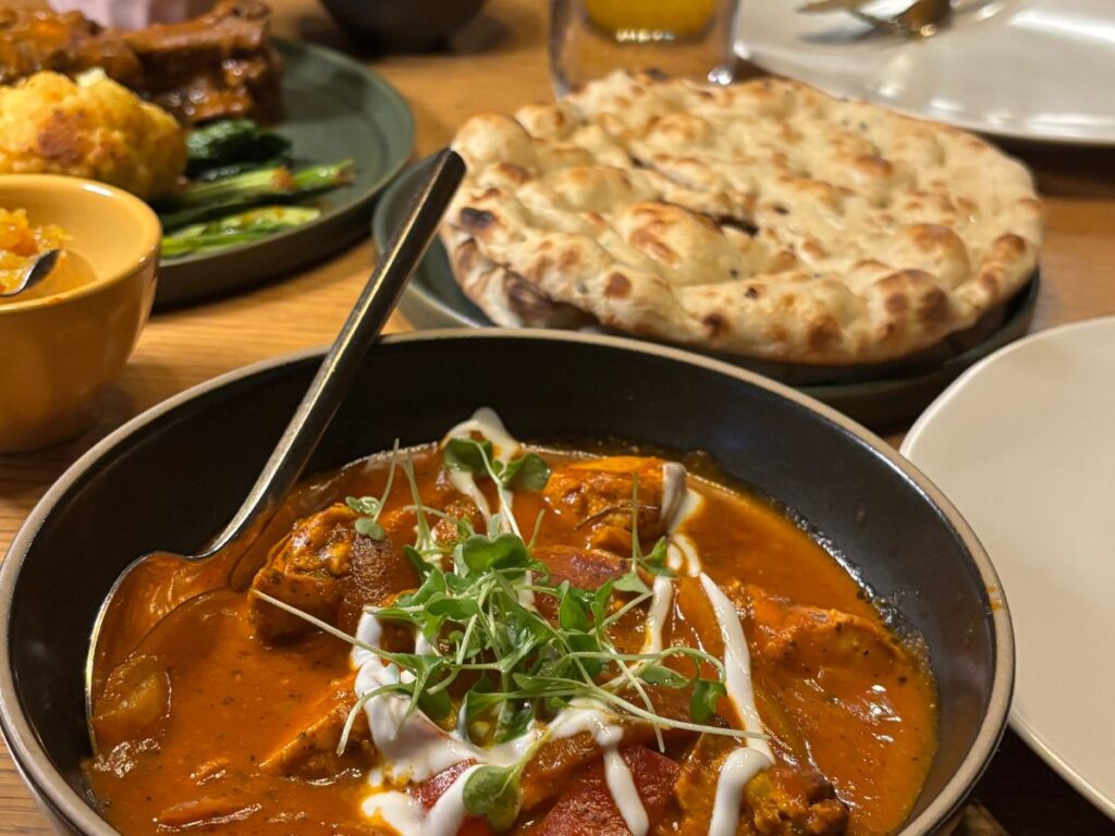 Selection of Indian dishes including curry on the table at Nirvana Indian Cuisine, Deming Street, Woodstock, NY