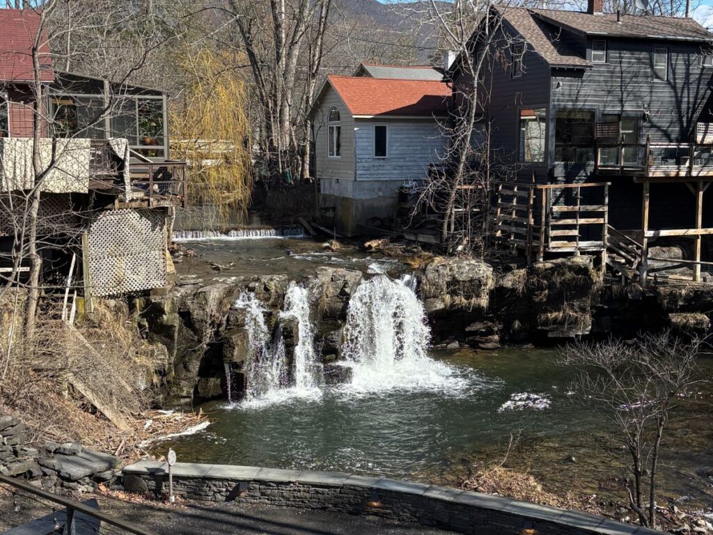 Tannery Brook cascading over rocks through the village of Woodstock, New York, in early spring.