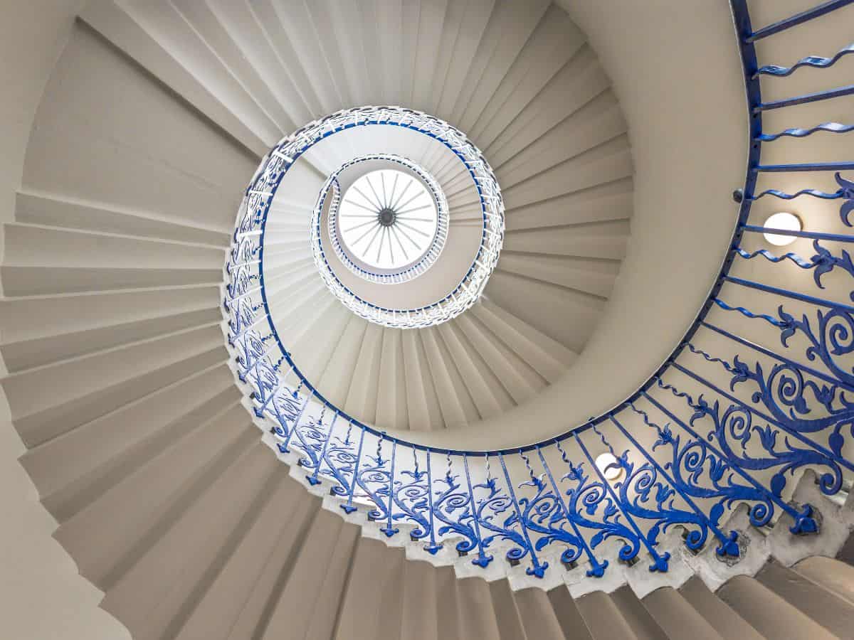 Famous blue and white spiral Tulip Staircase as seen from ground floor at Queens House, Greenwich.