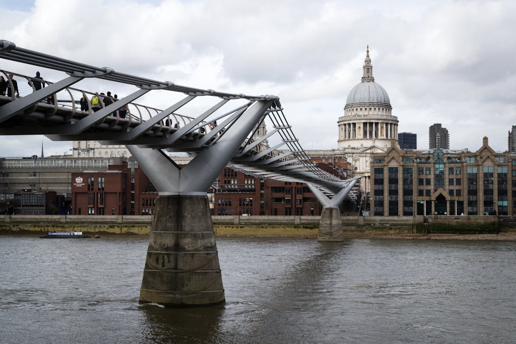 Stunning view of Millennium Bridge leading to St. Paul's Cathedral in London.